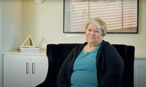 a woman sitting in a chair